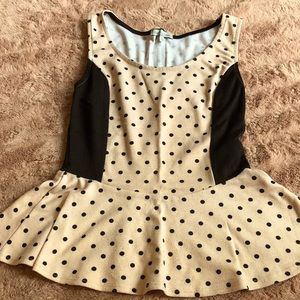 Pink and black polka dot peplum top